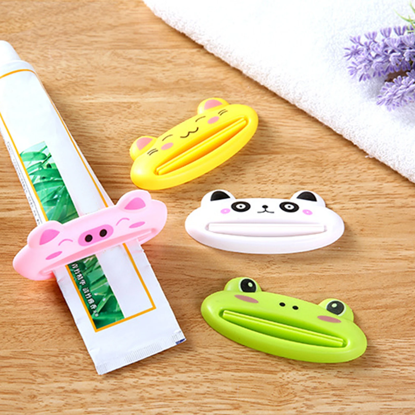 

4pcs Toothpaste Squeezers Dispenser Household Cartoon Toothpaste Holder Multifunctional Squeezer Press Bathroom Accessories