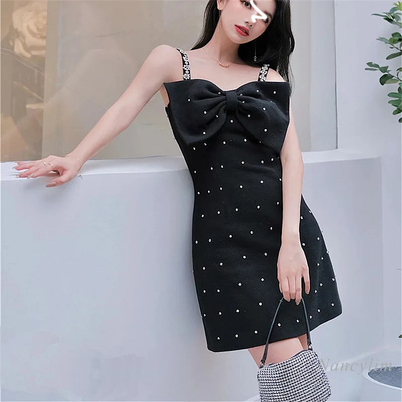 

2022 Summer Spaghetti Strap Dresses Womens Black Crystal Bow Waist Trimming Dress Female Outfit Temperament Party Vestidos