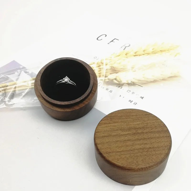 

Round black walnut ring case wedding ring case proposal ring case earring case LOGO Amazon