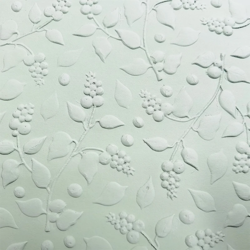 Объемная текстурная папка с рельефным рисунком снежинки используется для