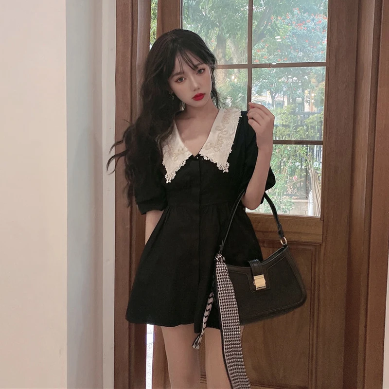 

Summer 2022 New Retro French color contrast doll collar with a slim waist, bubble short sleeve dress, children's foreign style