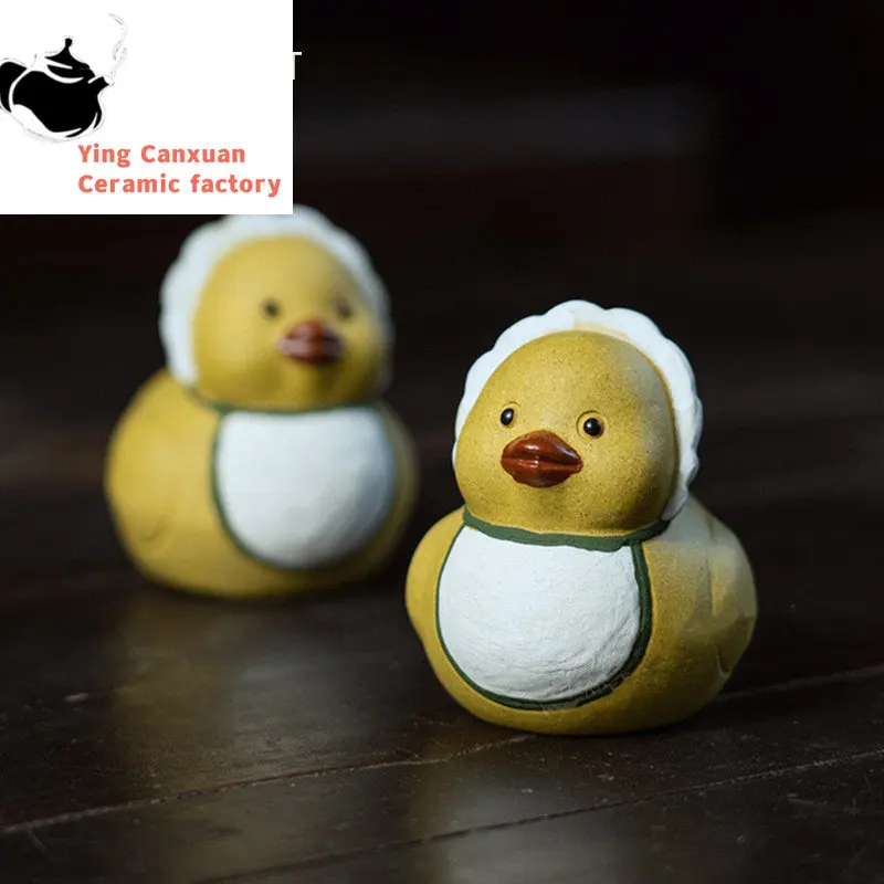 

Chinese Yixing Purple Clay Tea Pet Little Yellow Duck Statue Ornaments Tea Figurine Handmade Zisha Sculpture Tea Set Decoration