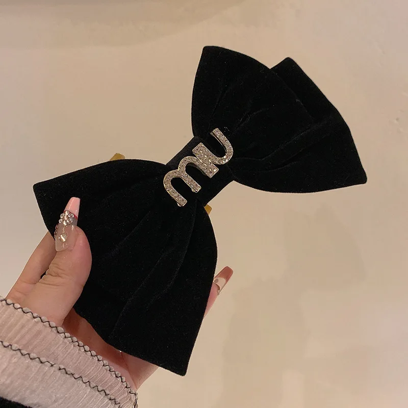 

Женский бархатный зажим для волос в виде когтей