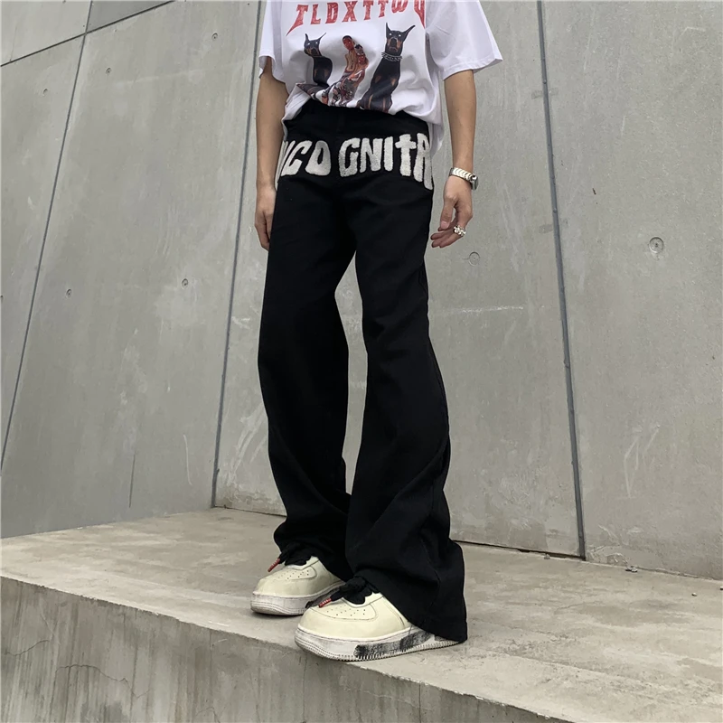 

Джинсы мужские прямые потертые в стиле ретро, рваные брюки оверсайз с вышивкой надписью, в стиле High Street, повседневные брюки из денима для пар