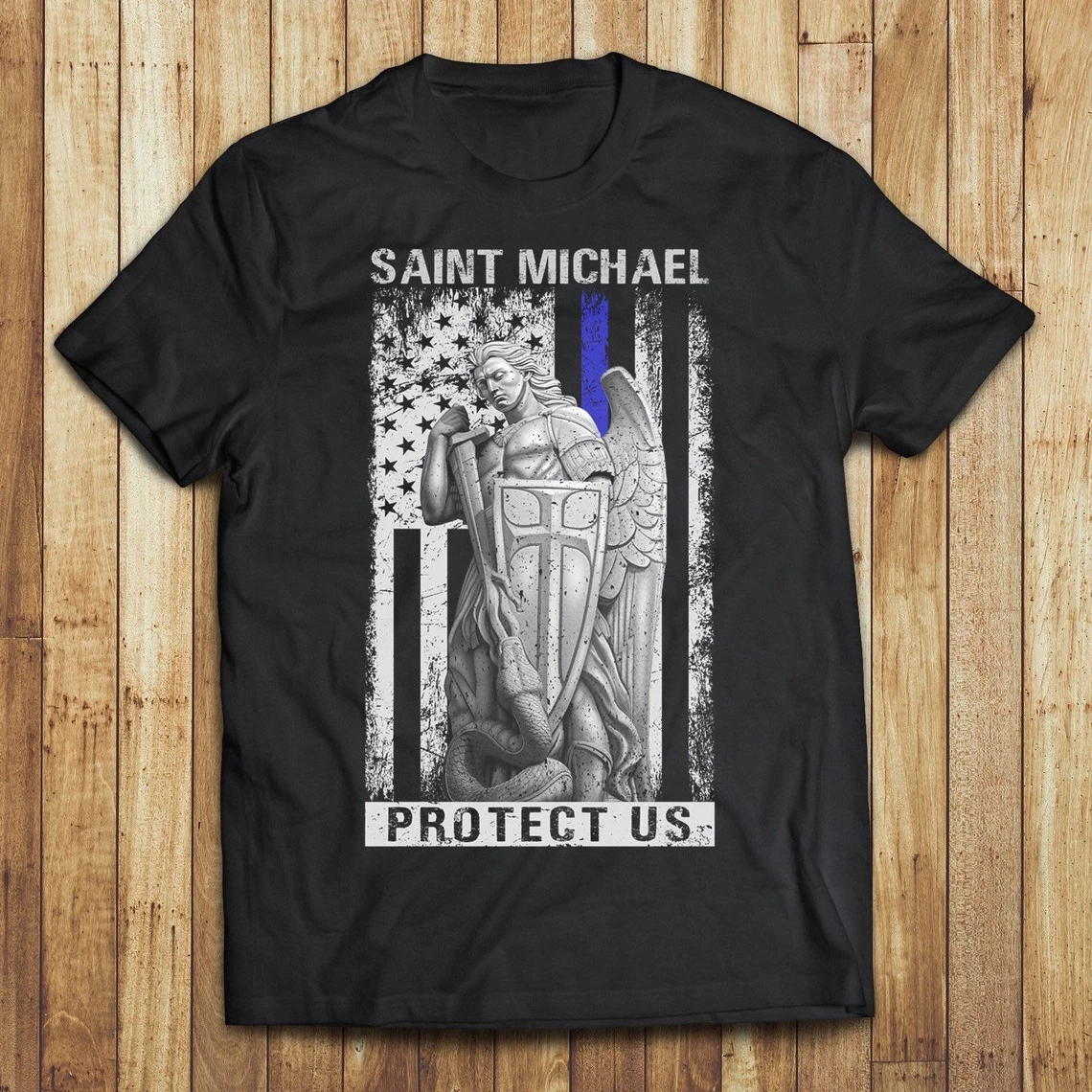 

Saint Michael Protect Us- Blue Line American Flag T-Shirt Short Sleeve Casual 100% Cotton O-Neck Summer Mens T-shirt Size S-3XL