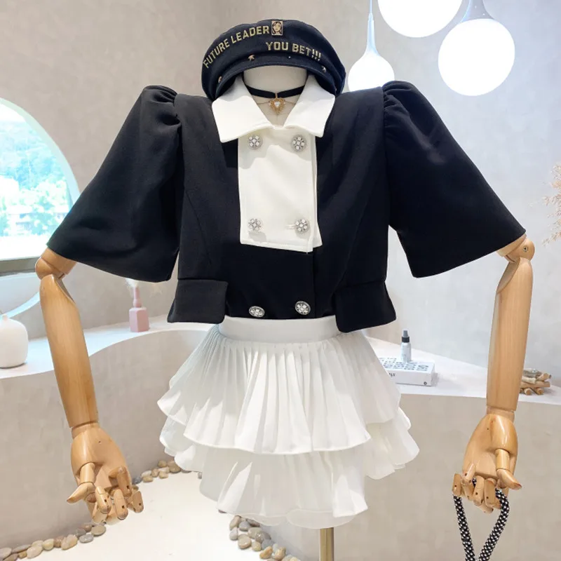 

Женский комплект из двух предметов, двубортный топ с коротким рукавом и отложным воротником контрастных цветов и юбка-штаны с оборками, Нов...