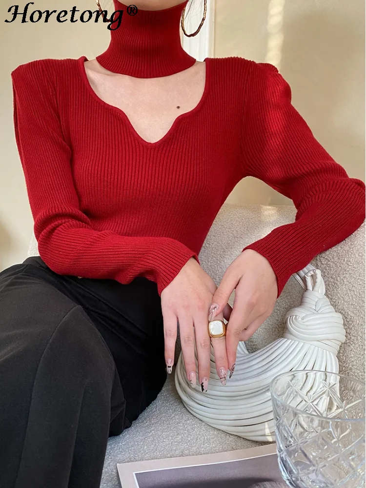 

Женский вязаный свитер с рукавами-фонариками и высоким воротником