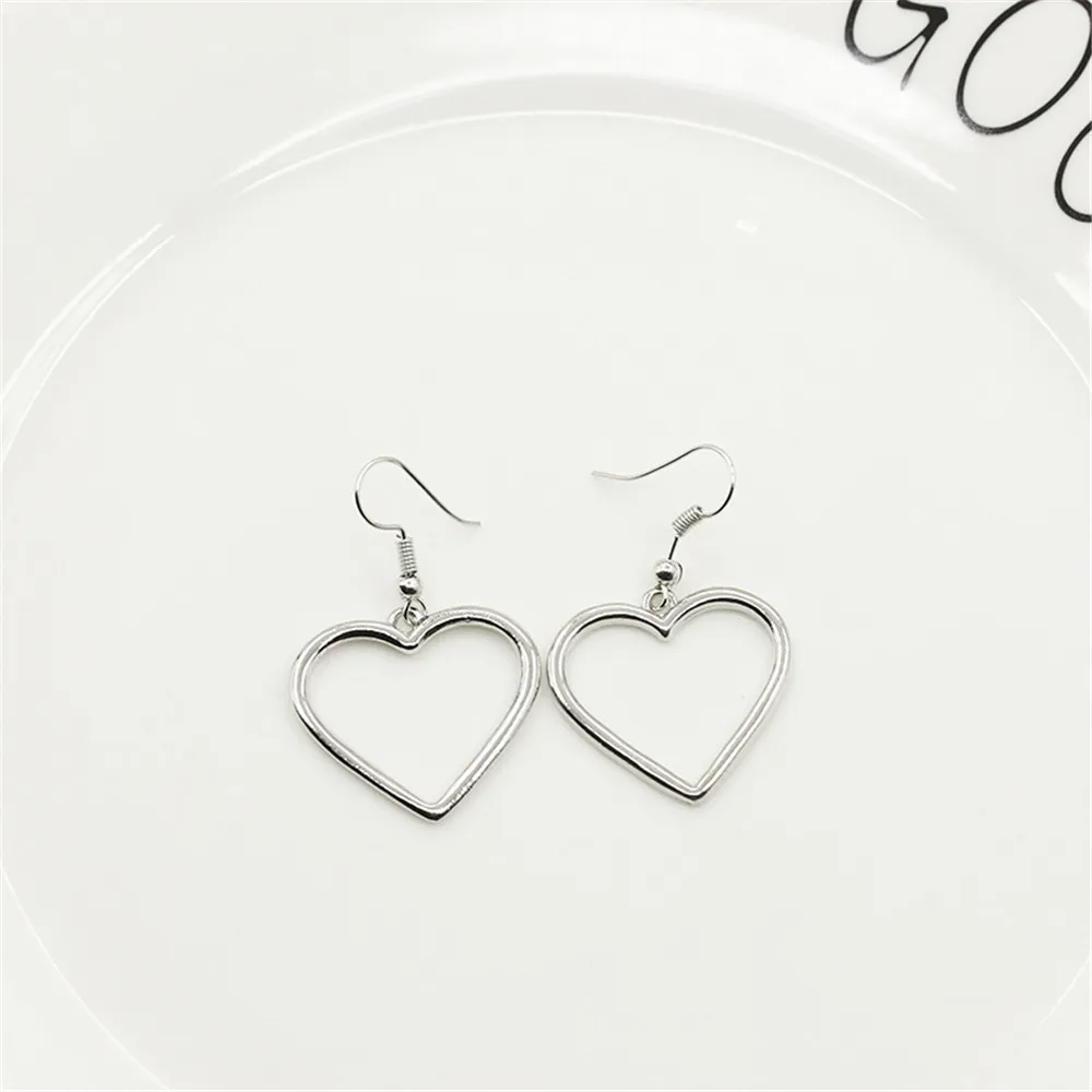 

Simple Design Silver Color Hollow Heart Drop Earrings for Women New Brand Fashion Ear Cuff Piercing Dangle Earring Gift