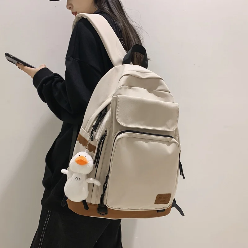 

TRAVEASY 2022 New Casual Pure Color Women Backpsck Men Contrast Schoolbag Female Hight School Students Bags Laptop Bags Simple