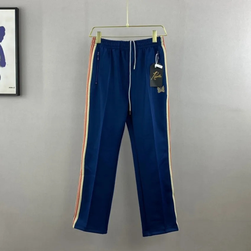 

2023 полосатые брюки для мужчин и женщин 1:1 высококачественные фиолетовые спортивные брюки с вышивкой бабочки AWGE тренировочные брюки