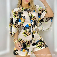 2022 spring and summer new womens printed lapel one row buttoned mid sleeve shirt jumpsuit women
