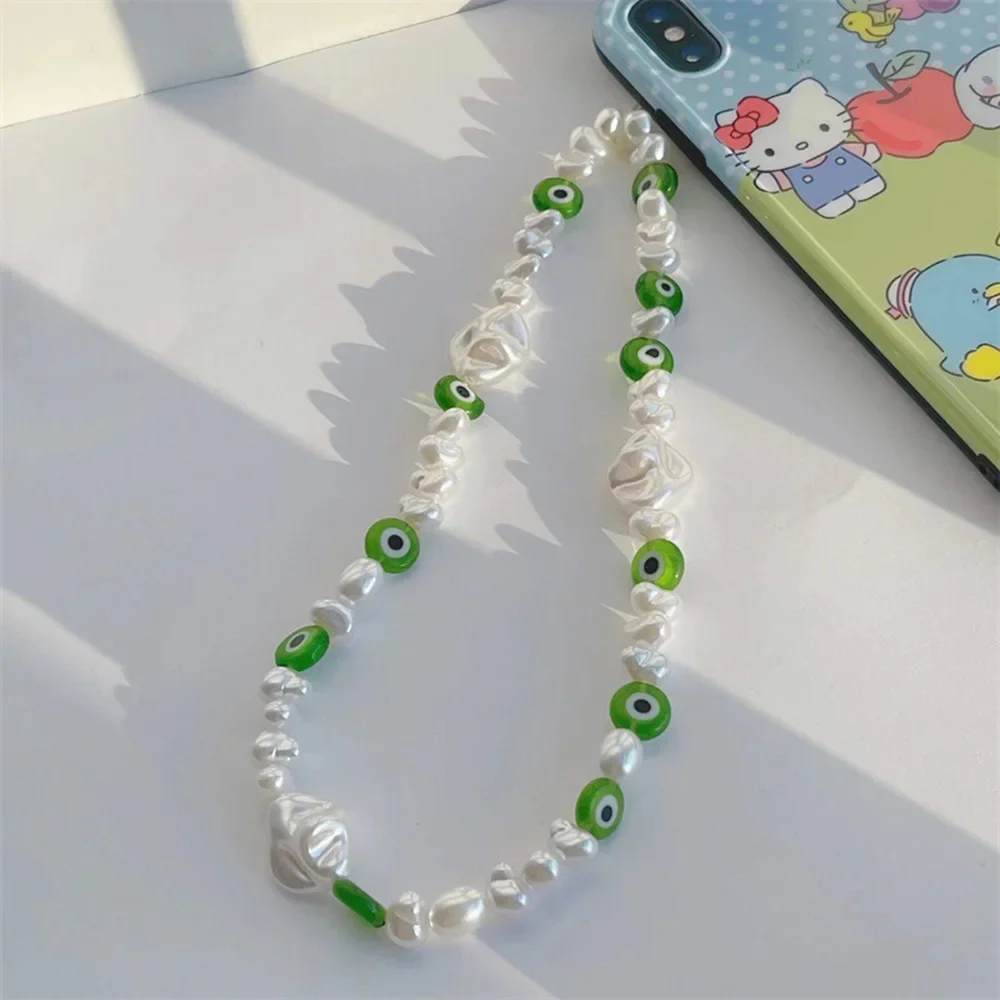 

2023 Baroque Pearl Eye of Evil Chain for Mobile Phone Fashion Phone Jewelry Charms Telephone Cellphone Anti-lost Lanyard Pendant