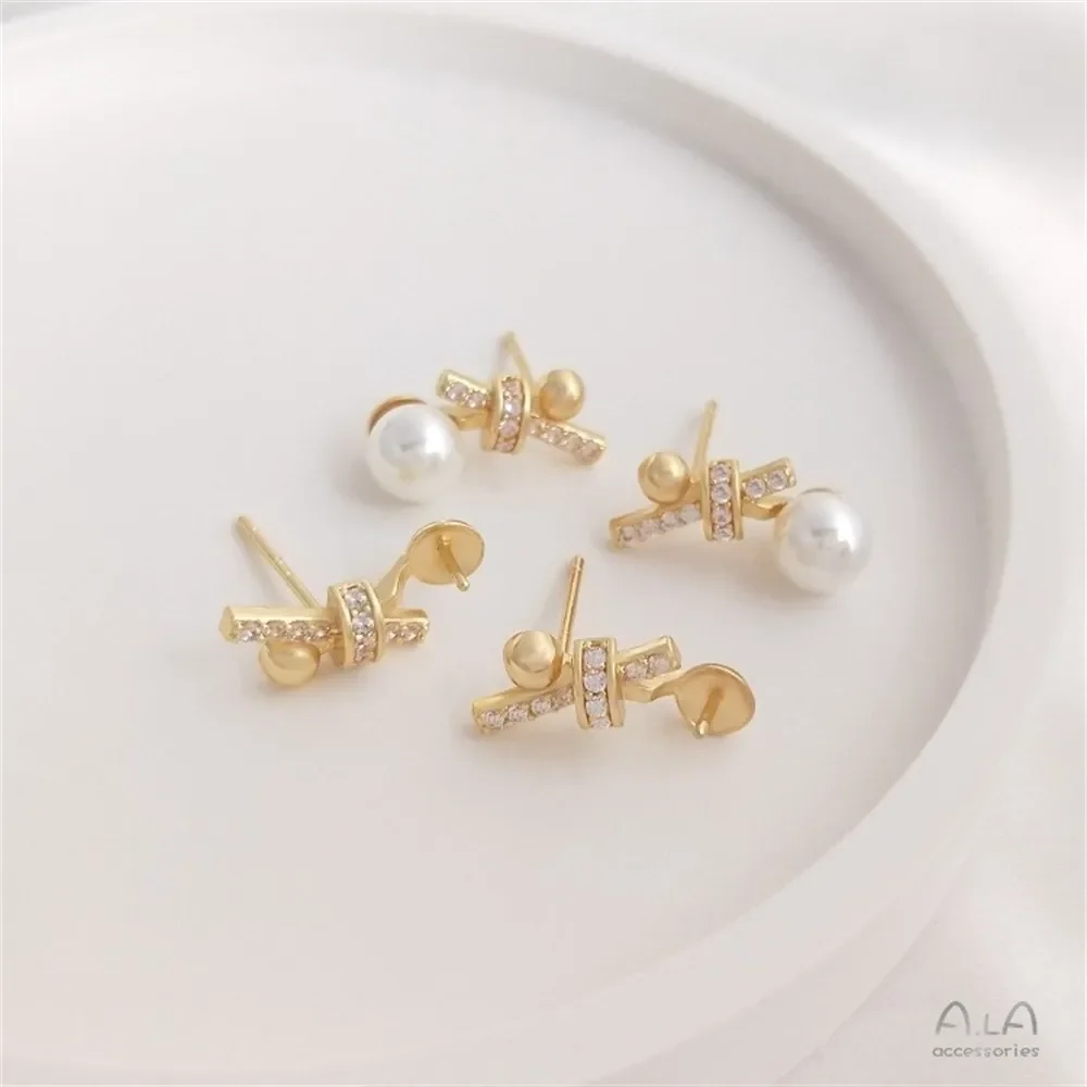 Серьги из бисера в форме банта с инкрустацией золотом 14 карат и цирконом серьги