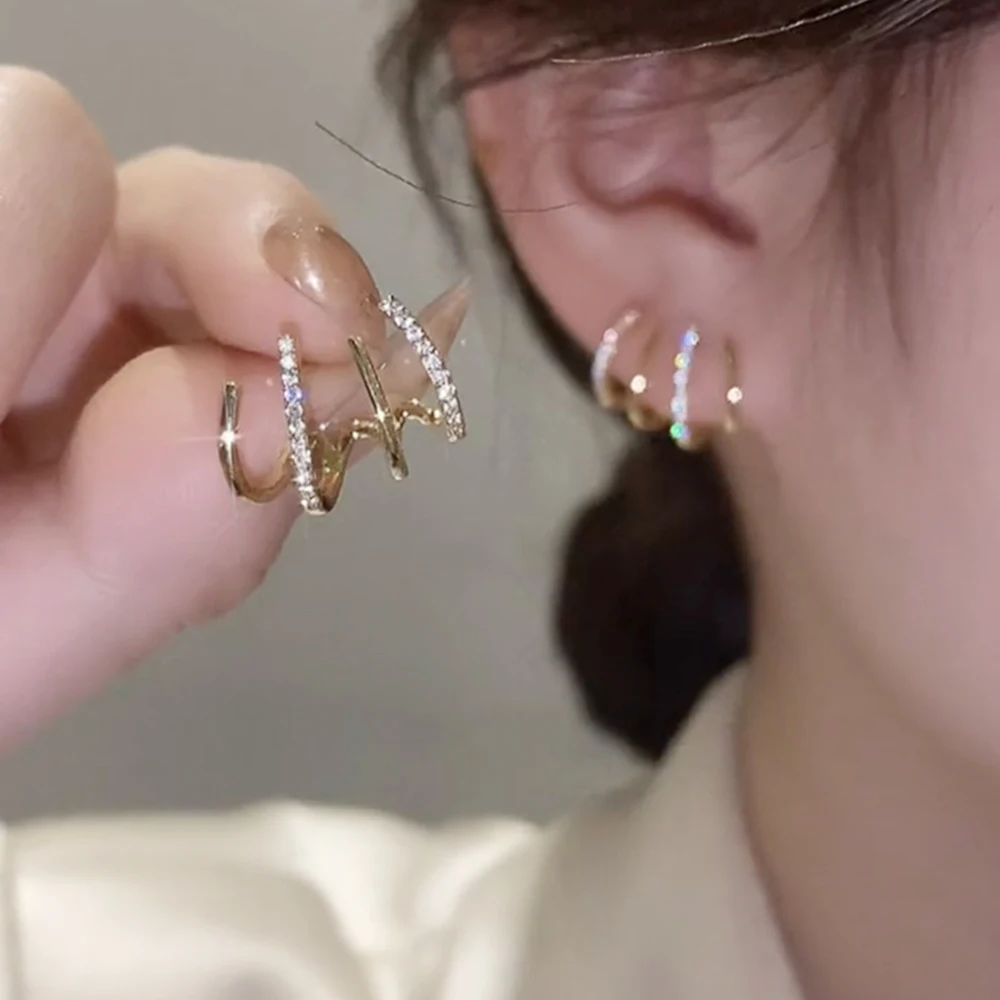 

Huitan Luxury Gold Color Claw Stud Earrings with CZ Stone Simple Stylish Women's Ear Piercing Earrings Fashion Jewelry Drop Ship