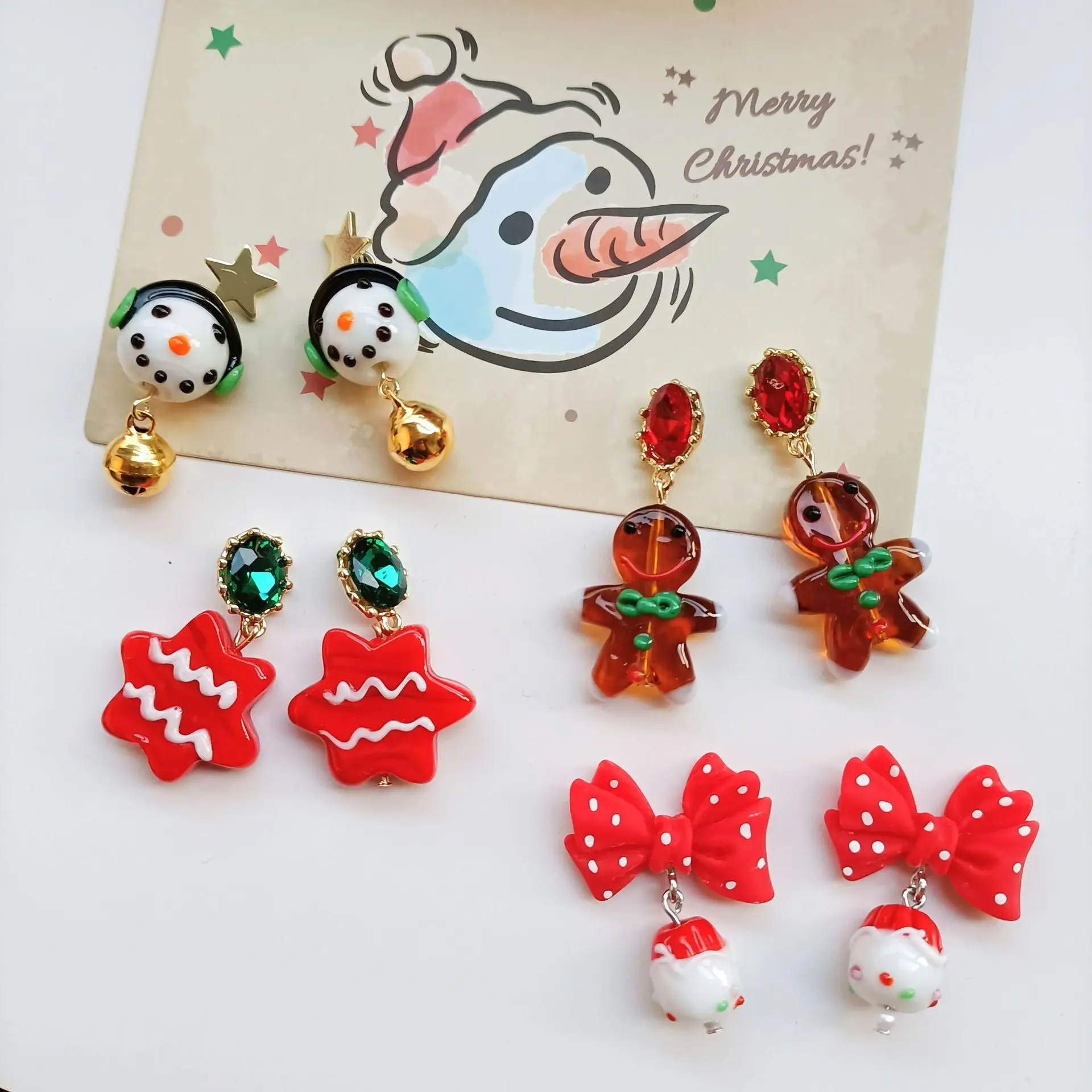 

Stars Gingerbread Man With Coloured Glaze Transparent Lovely Christmas Snowman Bowknot Earrings Ear Clip Earrings