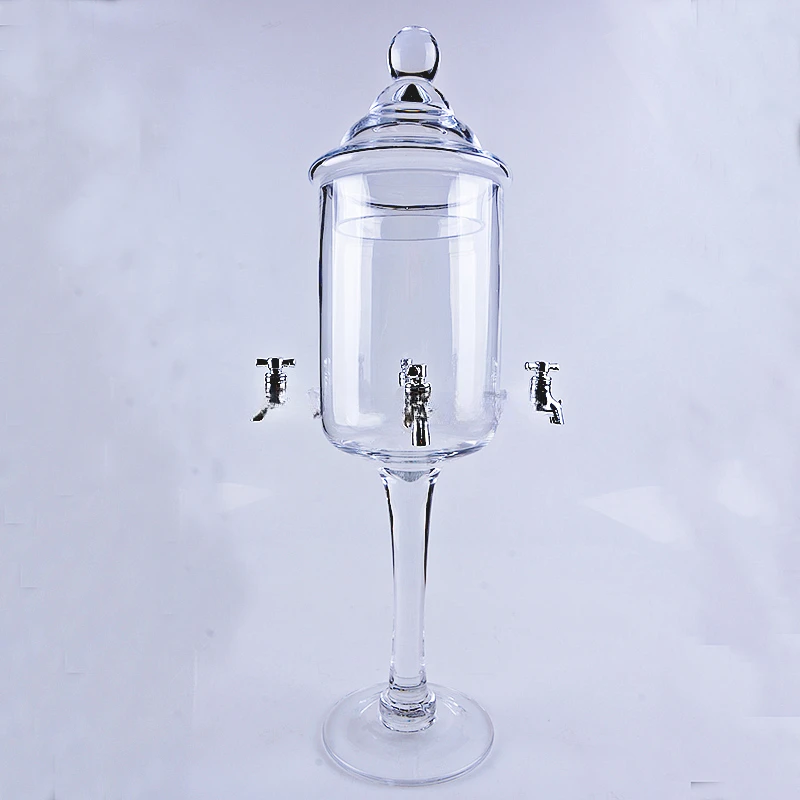 Стеклянный фонтан с двумя смесителями