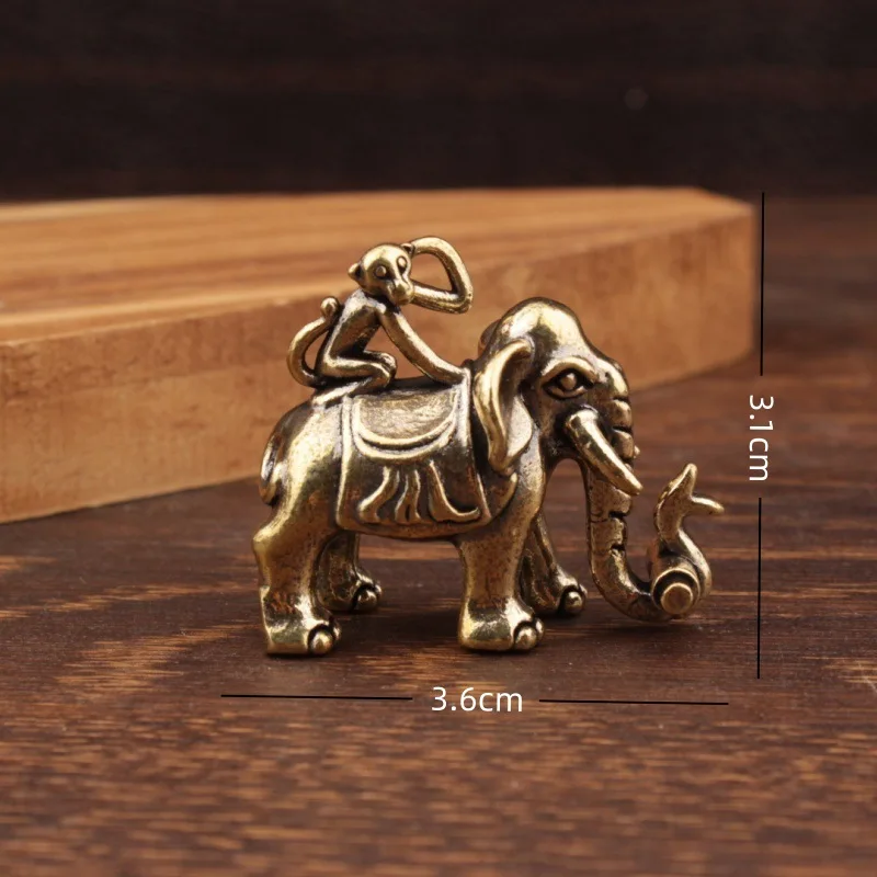 

Бронзовая статуэтка слона с обезьяной