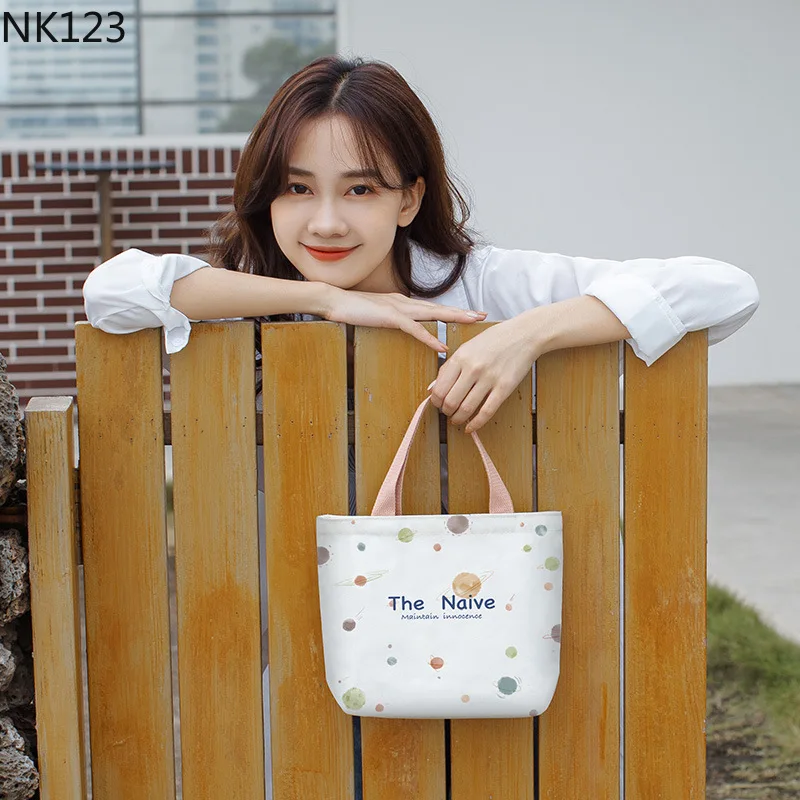 

Canvas bag 2022 women's new original design niche bag hand-held student ladies bag ins one piece