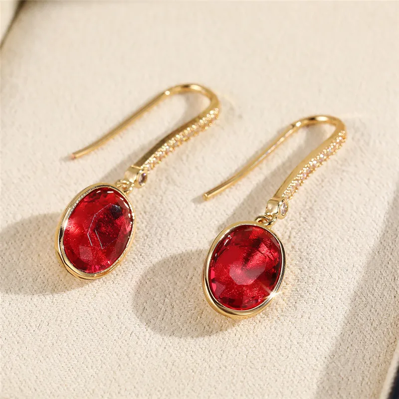 

Japan and South Korea simple Oval Red Glass Filled Earrings imitation red corundum gem versatile Earrings