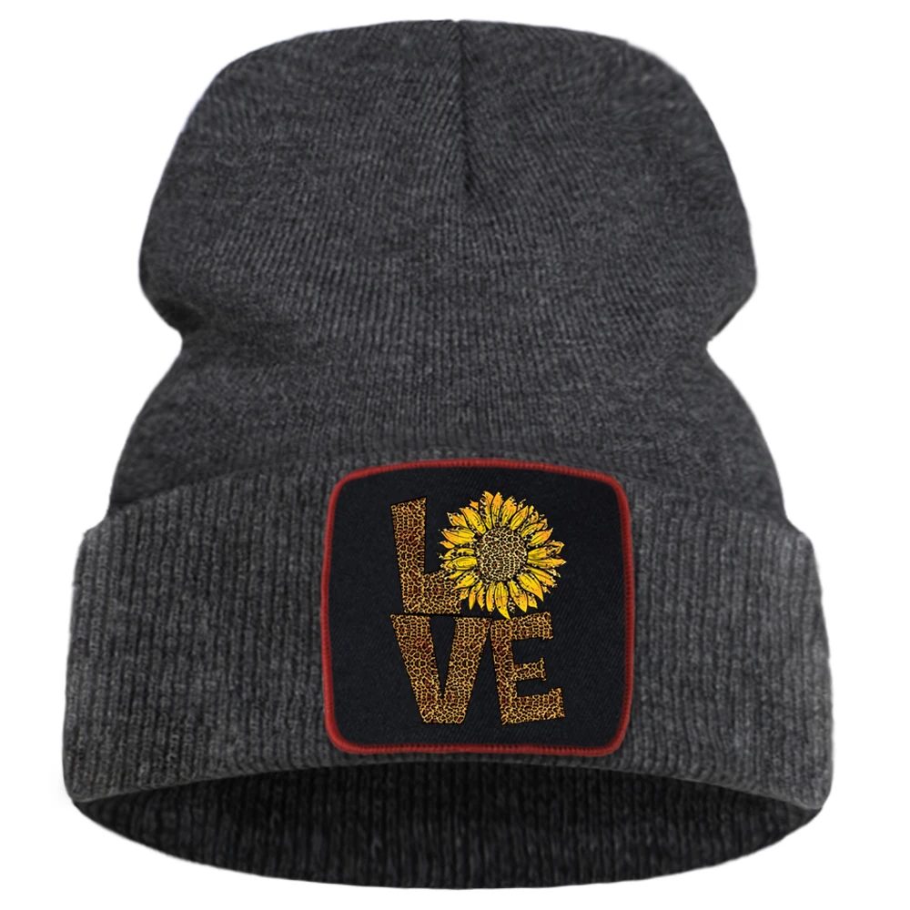 

Женская зимняя вязаная шапка с принтом в виде подсолнухов