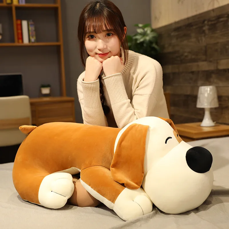 

Big stuffed dog doll sleeping on big stuffed dog pillow
