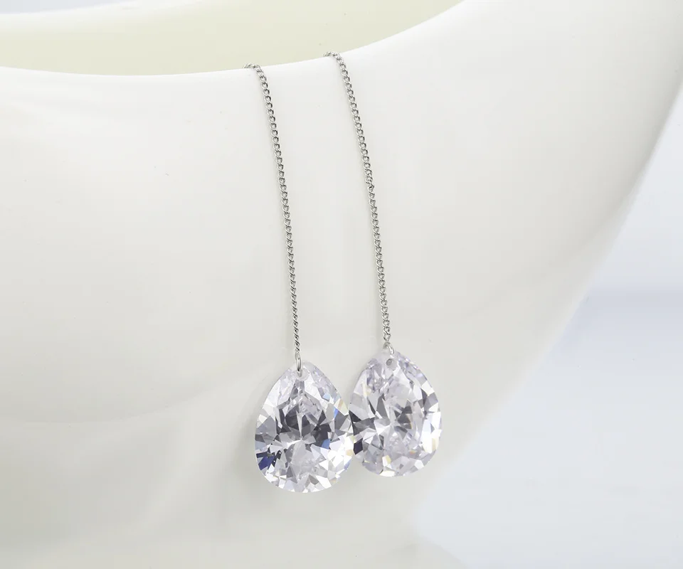 Серьги-подвески Elva Dong капельки циркония белые и золотые