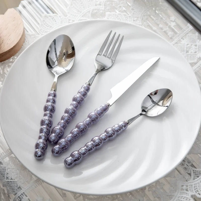 

Stainless Steel Western Food Set with Pearl Handle Knife Fork and Spoon Household Steak, Western Food, 4 Pcs