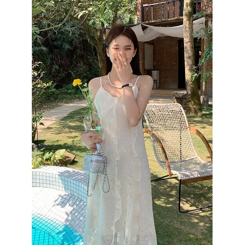 

High-quality Korean version of 2023 summer new French retro elegant lace embroidered skirt solid color sling dress.