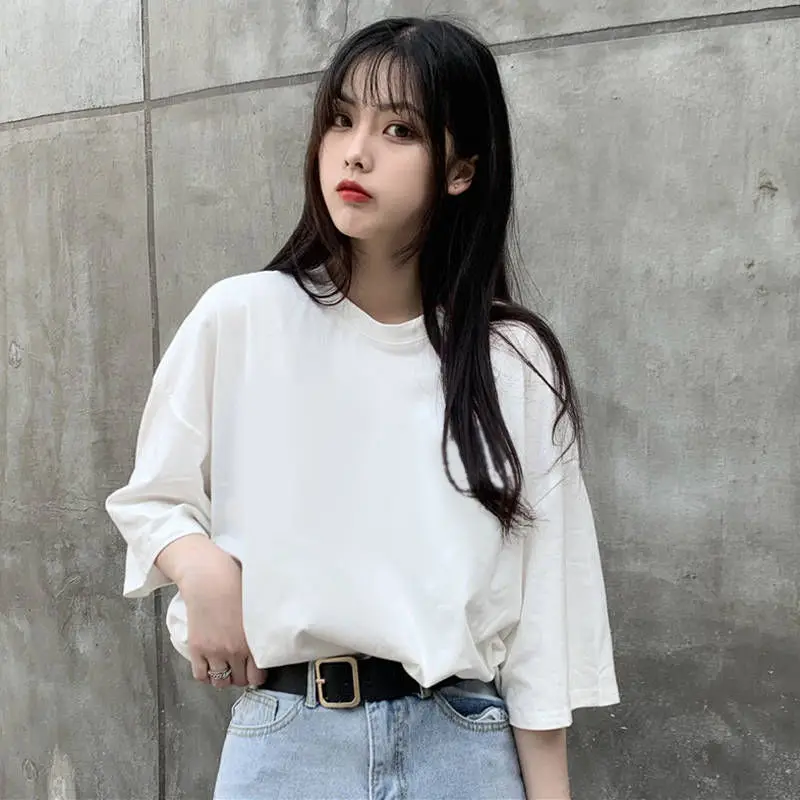 

Summer new Korean white T-shirt women's short sleeve loose and versatile foreign style medium long half sleeve solid color top