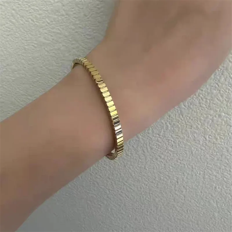 

Браслет с золотым покрытием, из титановой стали