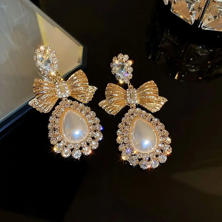 

Romantic Women Stud Earrings Imitation Pearl Delicate Female Bow Baroque Luxury Crystals Earring Party Gift Top Quality Jewelry