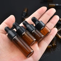 2050100pcs 1235ml amber empty glass bottles aromatherapy essential oil refillable bottles dropper bottle with black cap