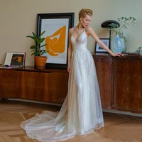 exquisite spaghetti strap sequined glitter wedding dress long modern embroidery crisscross backless bridal dress for wedding