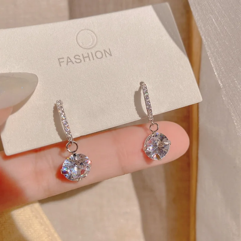 

Женские серьги-подвески с круглыми Фианитами, серебро 925 пробы