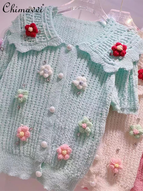 

Women's Short-Sleeved Knitted Cardigan 2022 Summer New Korean Fashion Sweet 3D Crocheted Hollow Doll Collar Slimming Tops