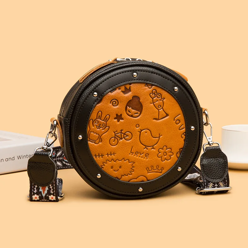 

New 2023 ladies round small bag leather retro handbag leather shoulder bag embossed leather carving technology.