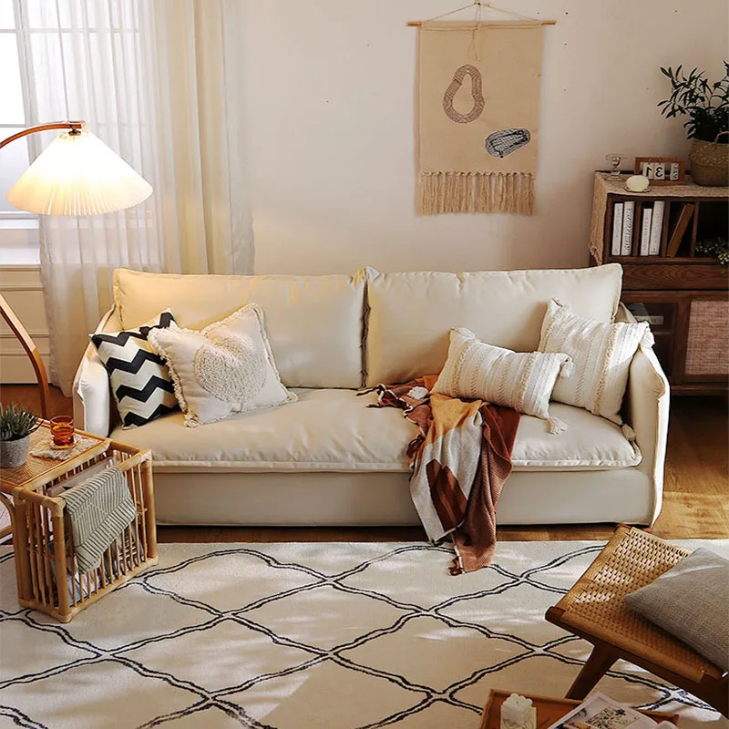 

Nordic modern simple small living room dismantling and washing vertical double ins style cream silent cloth sofa