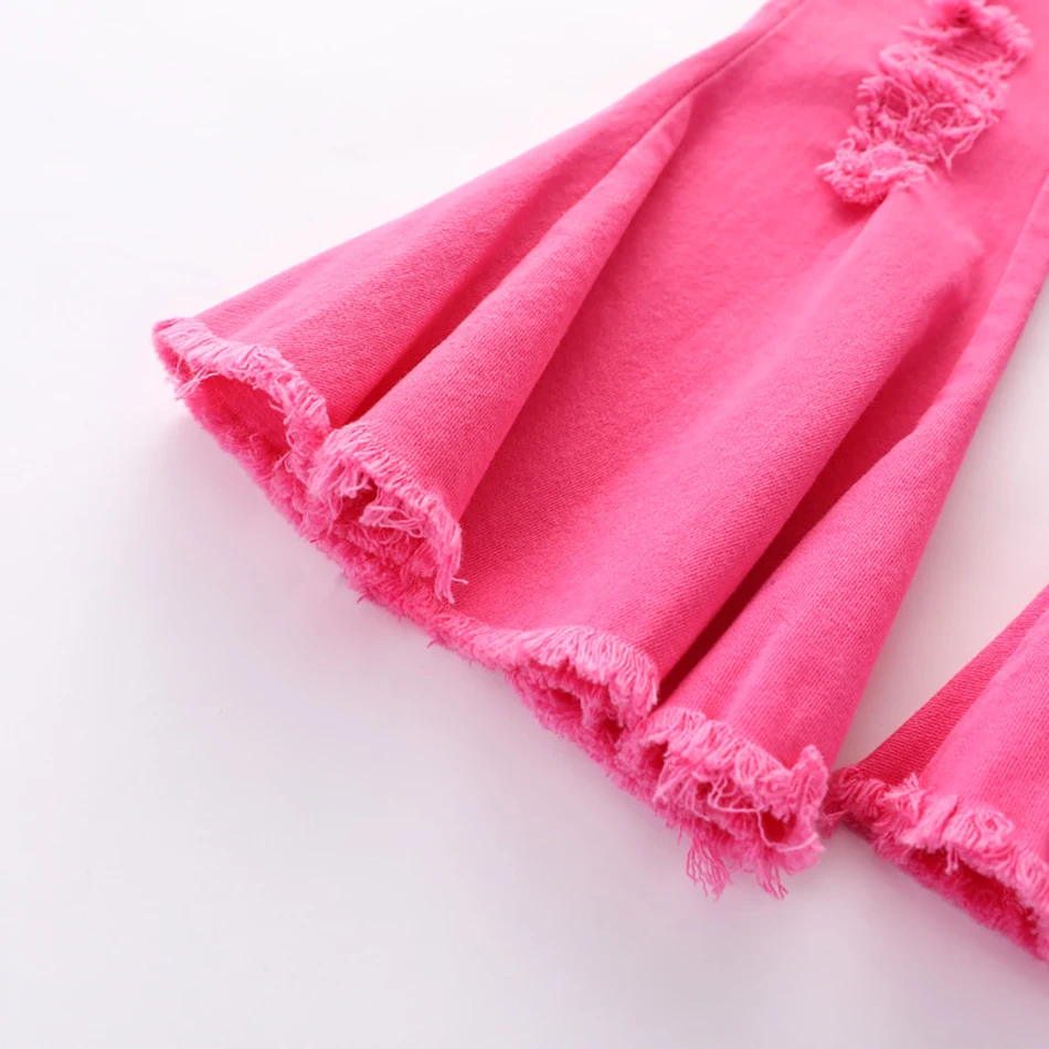 Очаровательные и модные джинсовые расклешенные брюки для девочек с потертостями