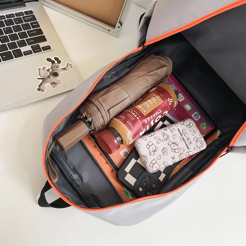 OutdoorTravelBetween Men And Women Large Capacity Backpack Students Color Computer Bump bolsas femeninas fitness bag sporttassen