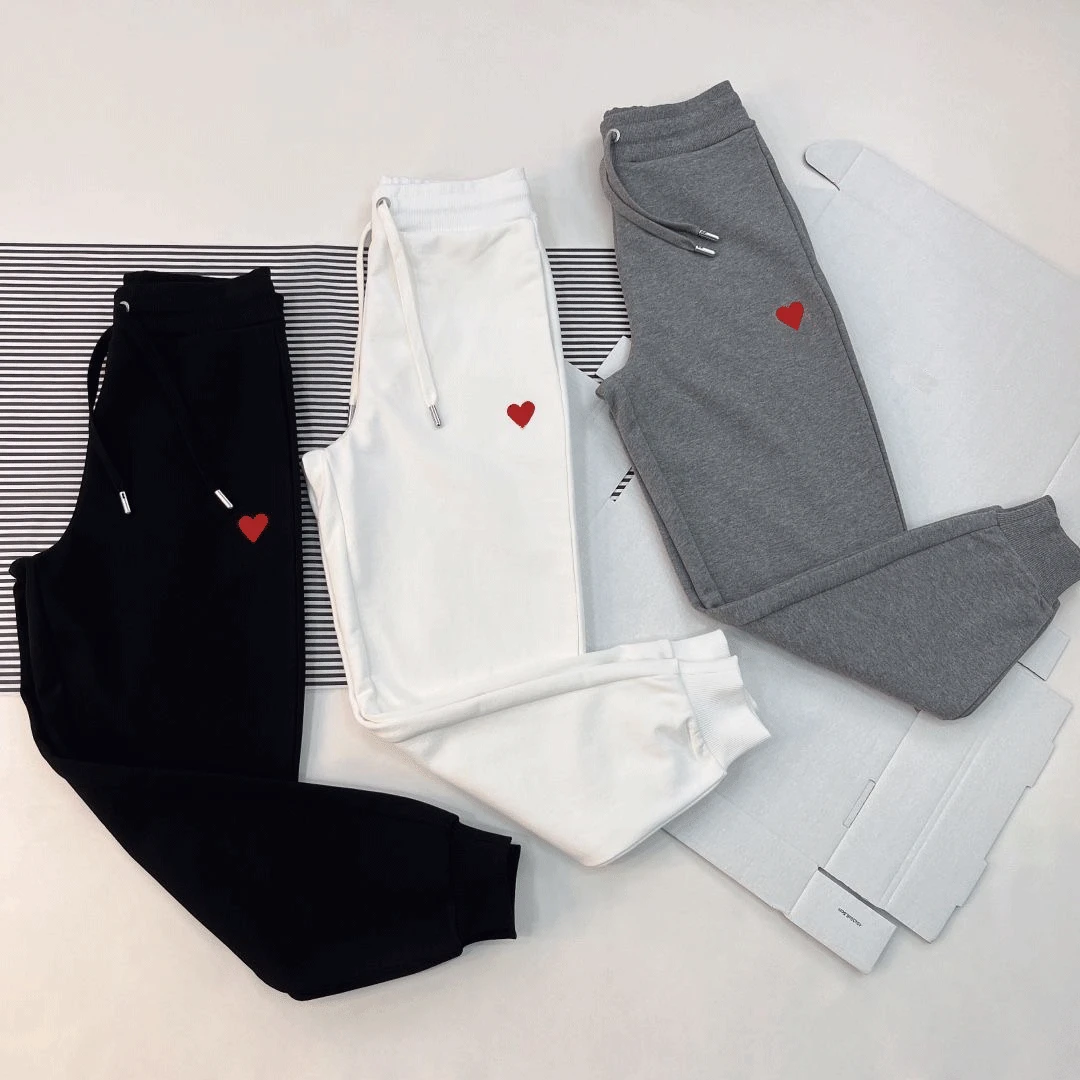 

2023 spring and autumn new red love embroidery solid color trousers sports loose men's and women's casual pants beaming pants