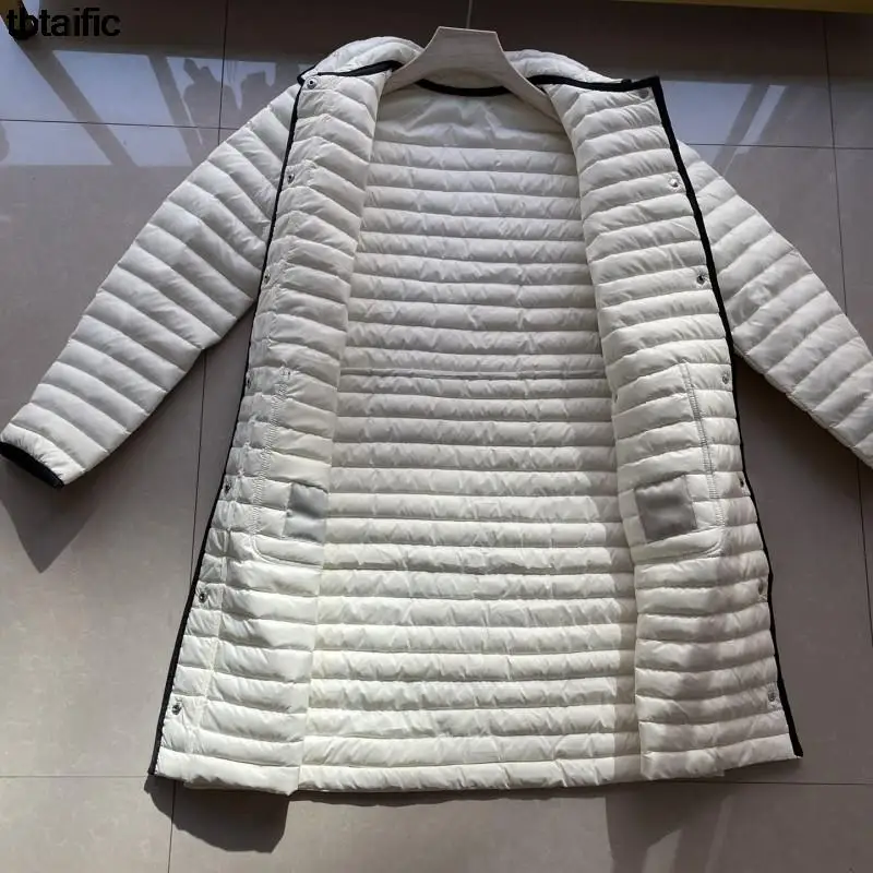 Рисунок 2 - Женский пуховик с воротником-поло