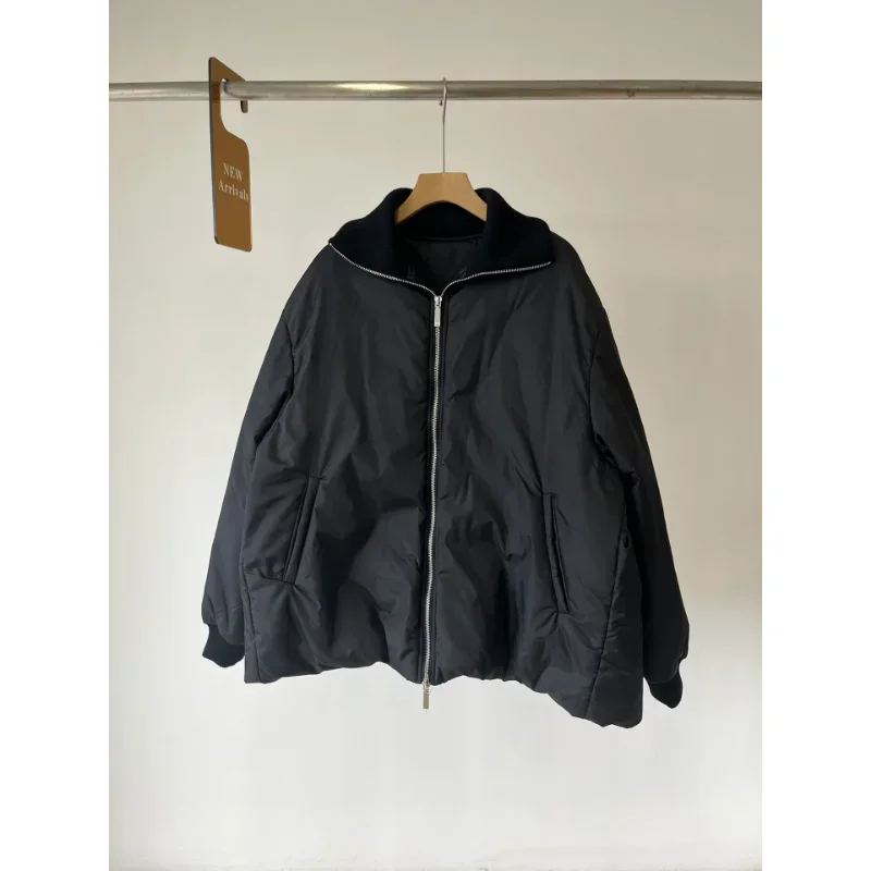 Женская свободная водолазка с рукавами и нитками