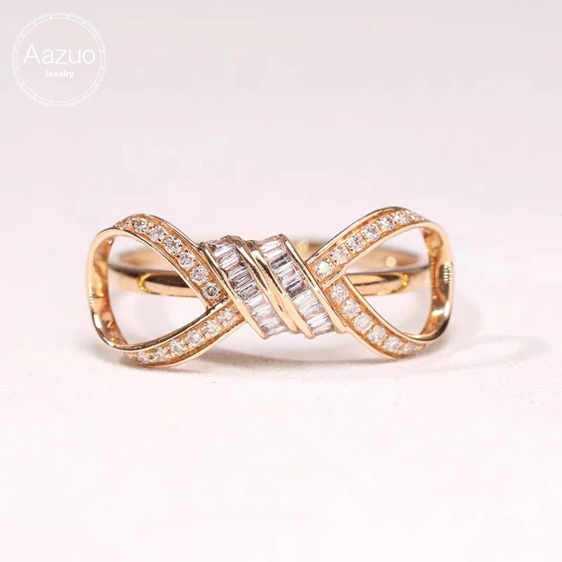 Женское золотое кольцо с бантом желтое золото 18 карат