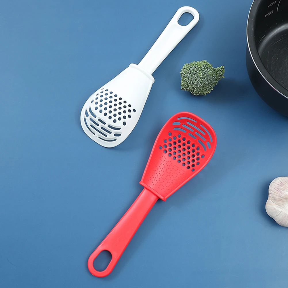 

Multifunctional Cooking Spoon Heat-resistant Kitchen Strainer Scoop to Cut Garlic Hanging Hole Innovative Potato Garlic Press