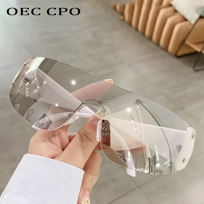 

OEC CPO New Punk One Piece Sunglasses Women Men Rimless Sun Glasses UV400 Ladies Oversized Fashion Eyewear Shades De Sol Oculos