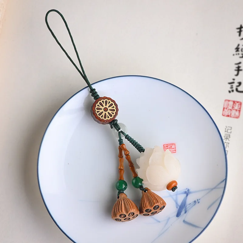 

Chinese style white jade bodhi cell phone hanging chain carving lotus mobile phone pendant peach wood lotus pod keychain pendant