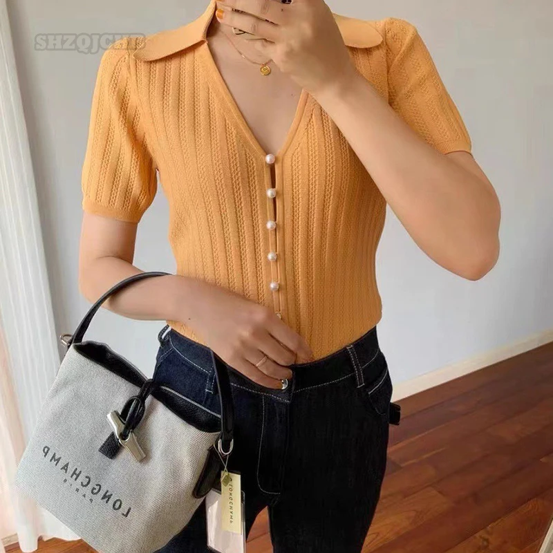 

2022 Summer Fashion New Simple V-neck Pearl Button Slim Fitting Knitted Short Sleeved Shirt