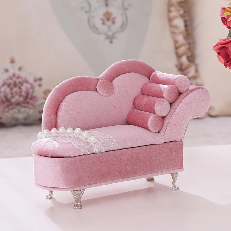 

Beauty is the original design of pearl lace pink velvet jewelry box sofa