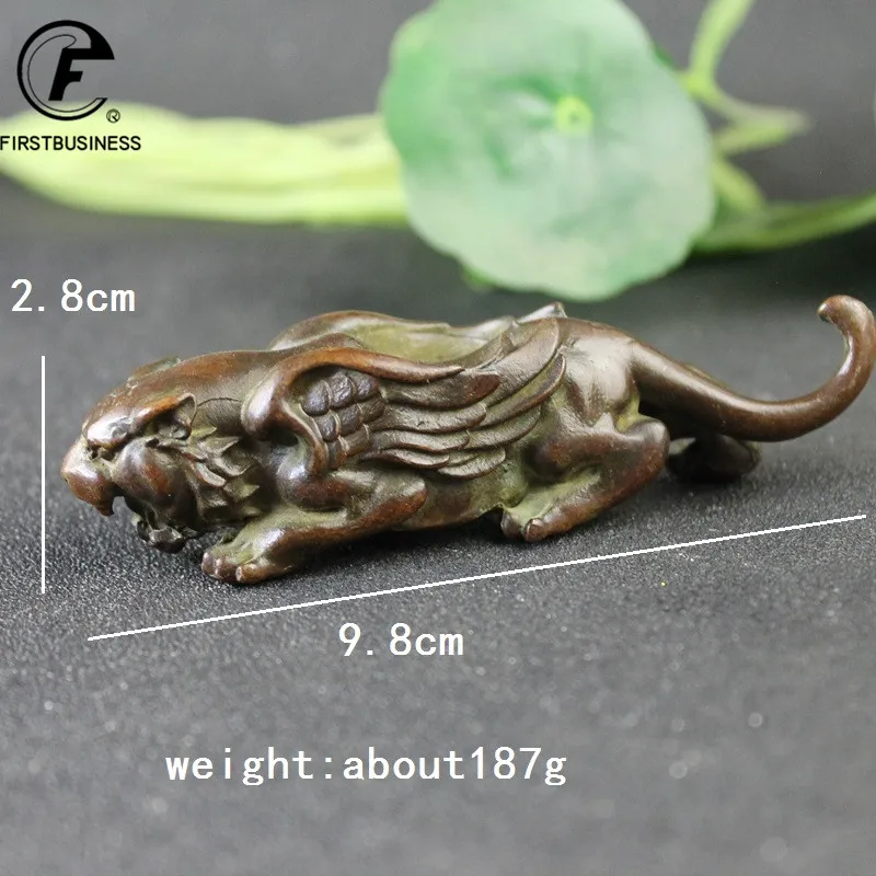 

Медная статуэтка тигра с крыльями