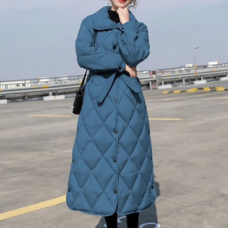 Женский длинный пуховик в клетку